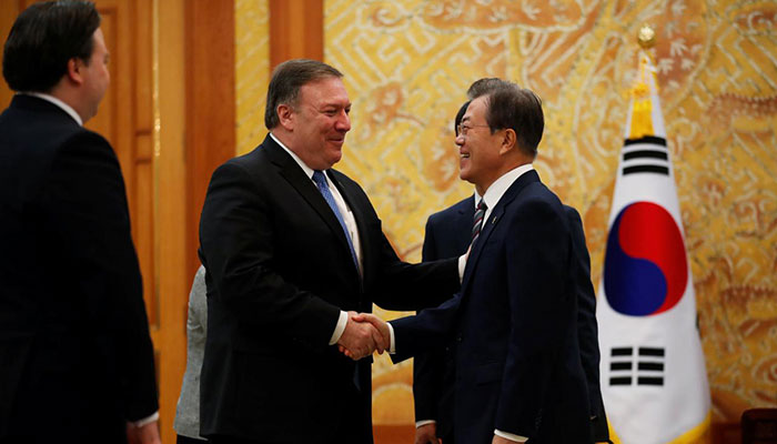South Korea's Moon meets Pompeo, says world has escaped nuclear weapons threat