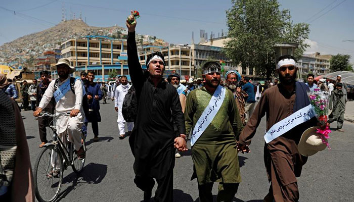 Afghan peace marchers arrive in Kabul exhausted and tired of war