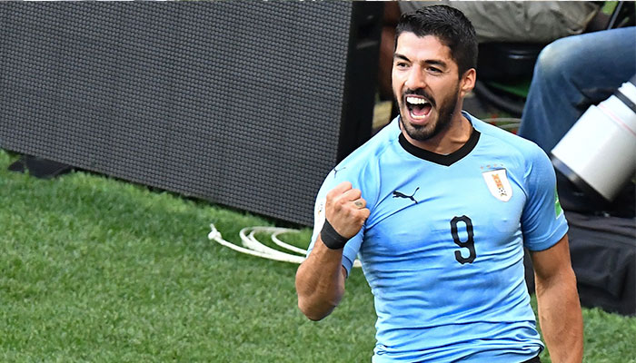 Suarez sends Uruguay into last 16 with hosts Russia