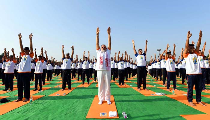Strike a pose: International Yoga Day stretches around world