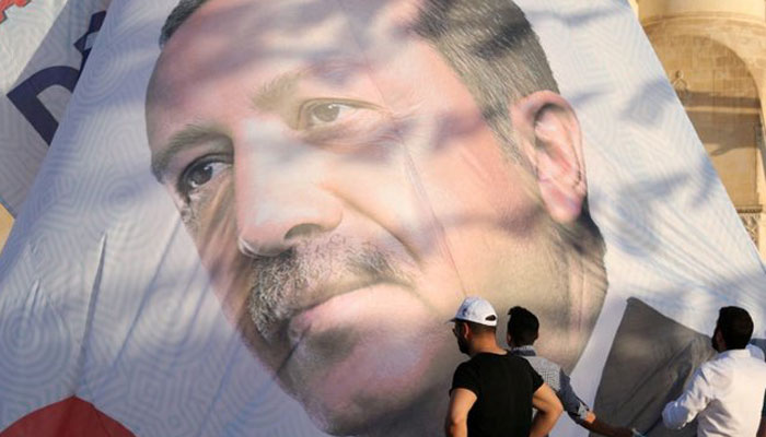 In Turkey's pious heartland, faith in Erdogan trumps economy worries