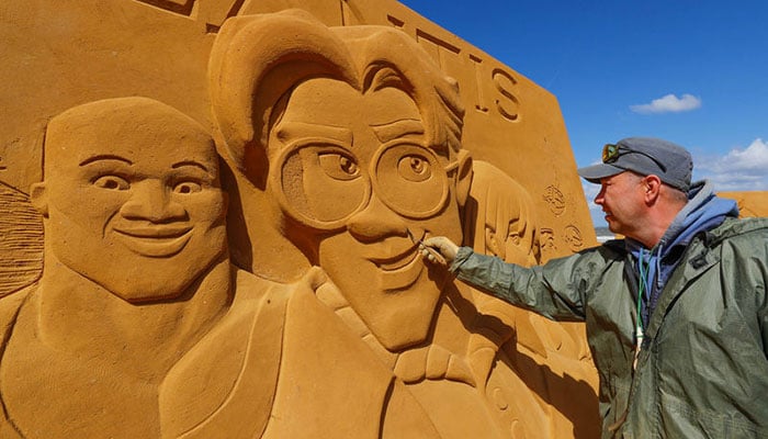 Belgium beach plays host to impressive Hollywood sand sculptures - in  pictures