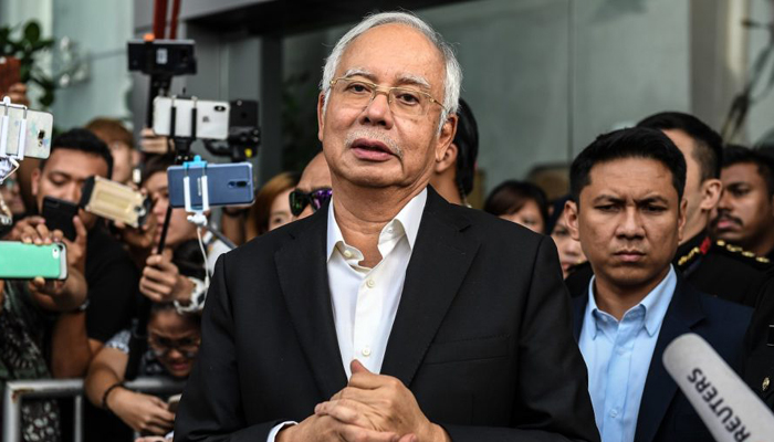 Former Malaysian premier Najib arrested, to be charged Wednesday