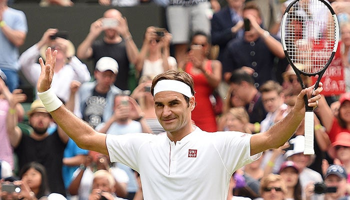 Federer, Serena in Wimbledon masterclass as Wozniacki crashes