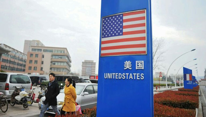 Asian markets fall ahead of US-China tariff deadline