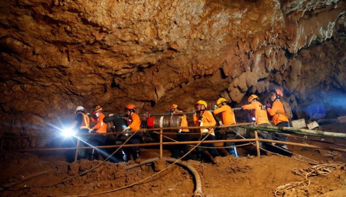 After heroic Thai rescue, cave-diving Australian doctor mourns father's death