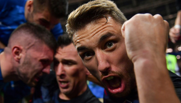 AFP photographer becomes part of Croatia World Cup goal celebration
