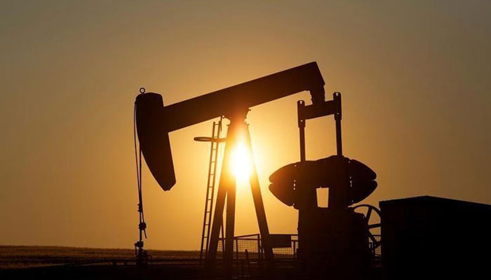 Oil prices fall on record US output, stock build
