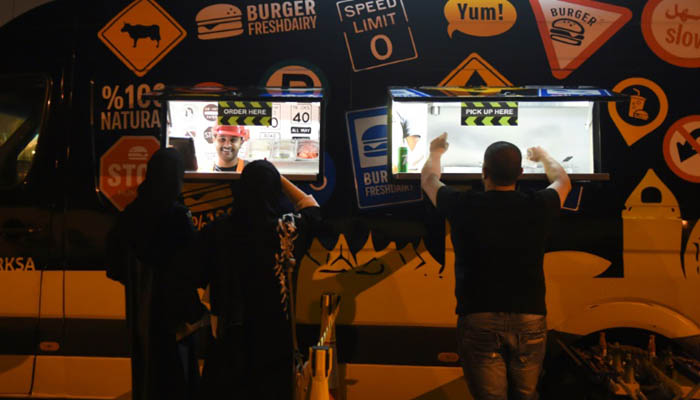 Burger on wheels: Saudis try once 'lowly' jobs as economy bites