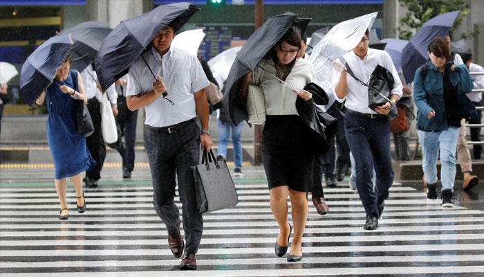 Strong typhoon churns towards Japan