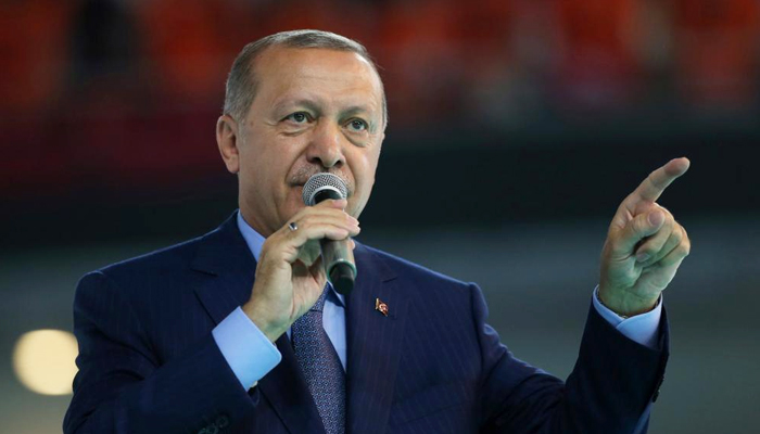 Erdogan says lira crash 'political plot' against Turkey