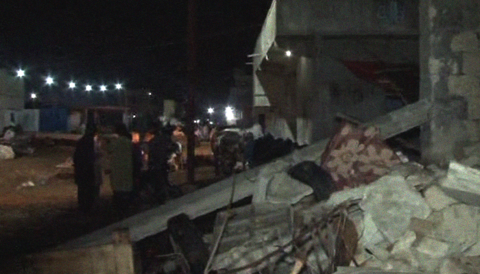 Five wounded as truck unloading livestock feed hits Baldia building, downs balcony