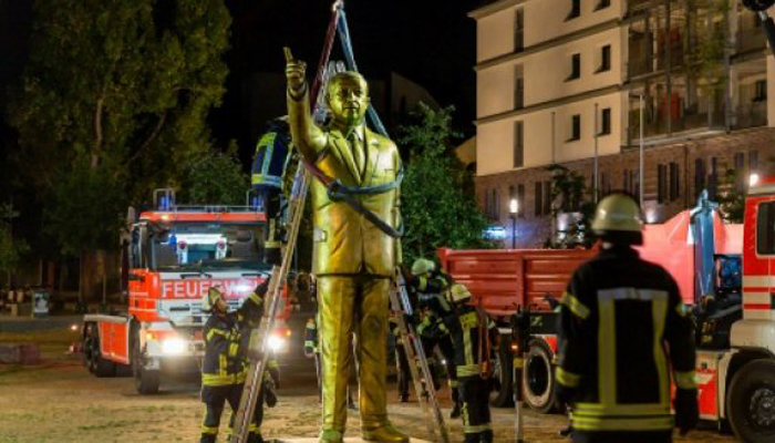 German city takes down golden Erdogan statue after outcry