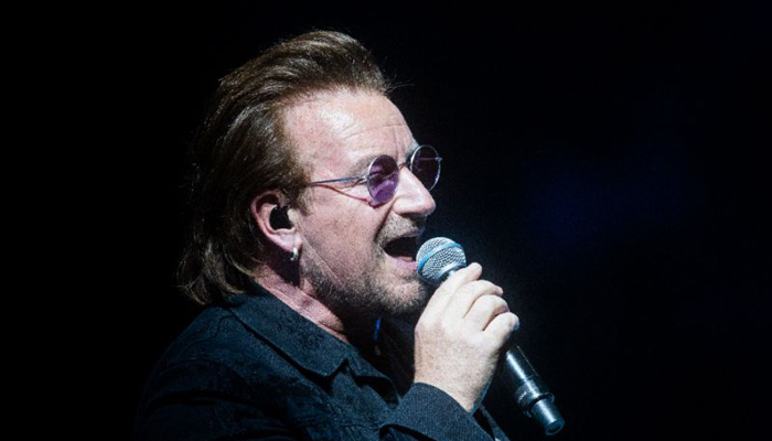 Bono says 'back to full voice', U2 tour will resume