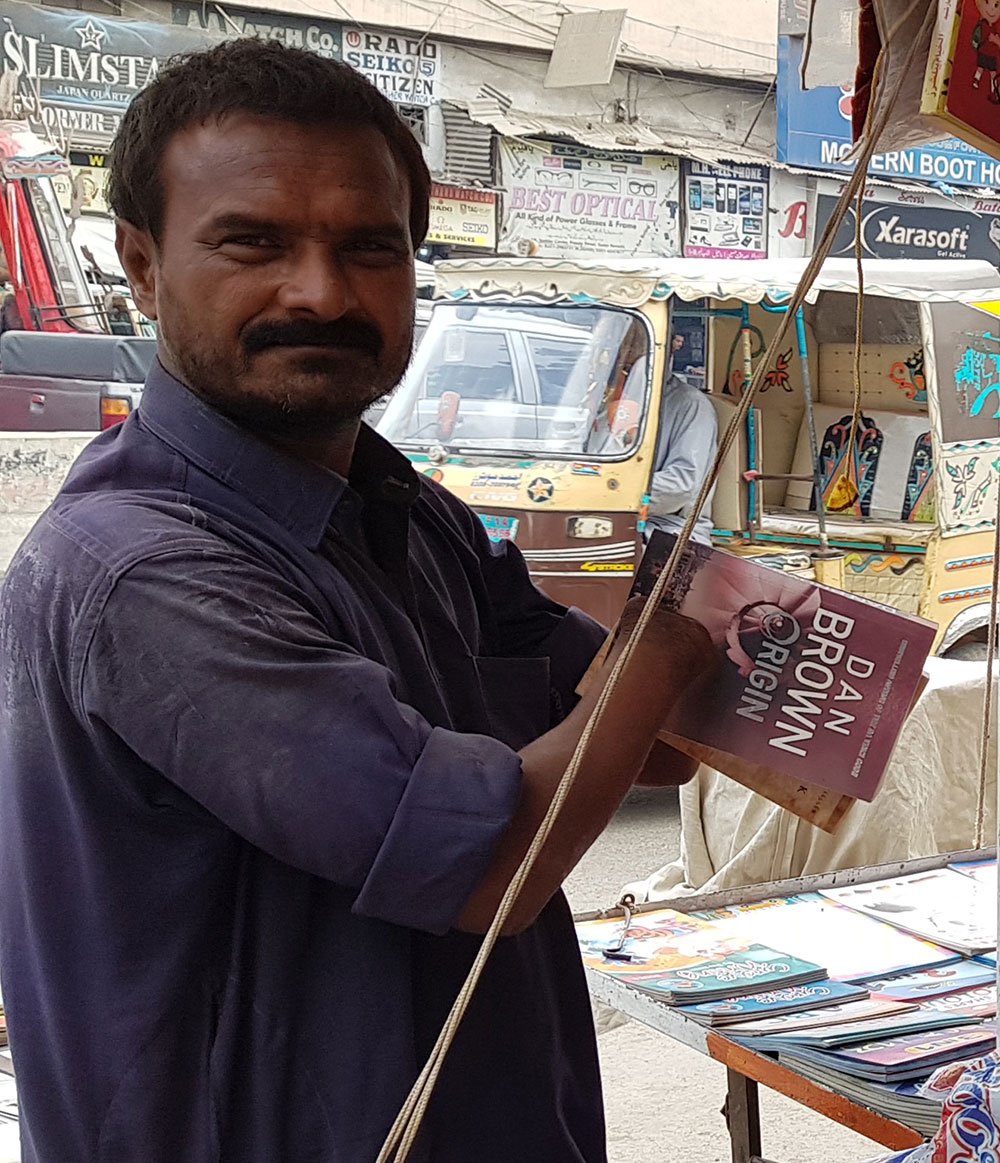 Disabled yet differently abled: Karachi bookseller with no hands makes an honest living