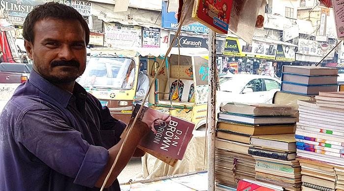 Disabled yet differently abled: Karachi bookseller with no hands makes an honest living