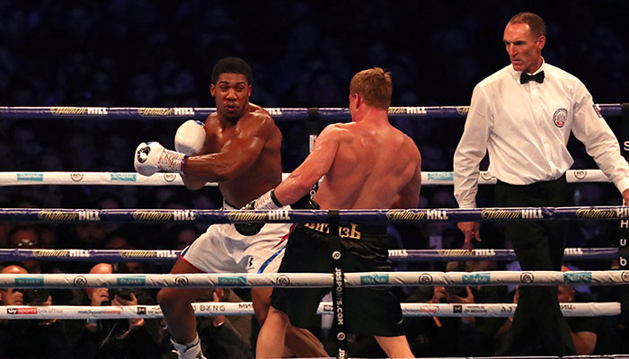 Joshua retains heavyweight crowns with Povetkin TKO