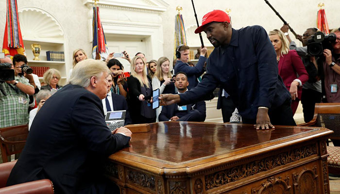 Kanye West defends support for Trump, in front of Trump