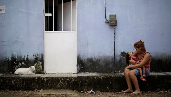 Mothers of babies afflicted by Zika fight poverty, despair
