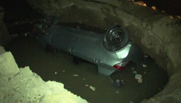 Two injured as car falls into ditch near Karachi's Punjab Colony