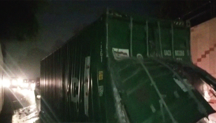 Container full of cosmetics gets stuck in Lahore underpass, topples over