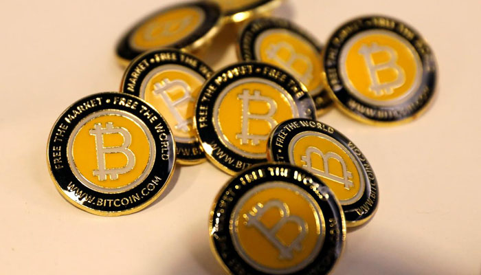 Factbox: Ten years of bitcoin