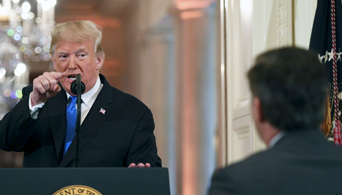 Trump says CNN's Acosta 'a rude, terrible person' over question about immigrants