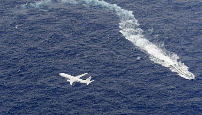 Crash kills US Marine; teams search for five in sea near Japan