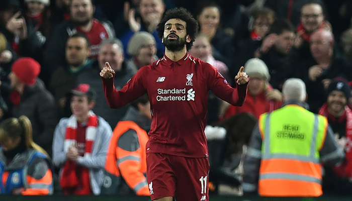 Salah sends Liverpool into last 16, Moura rescues Spurs