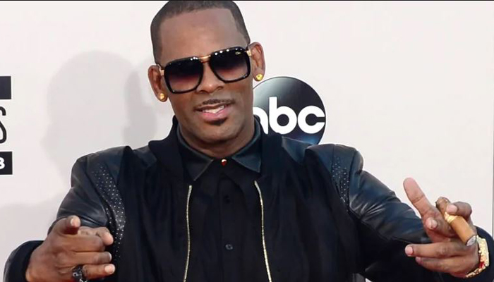 Woman suing R Kelly for sexual abuse says singer threatened her