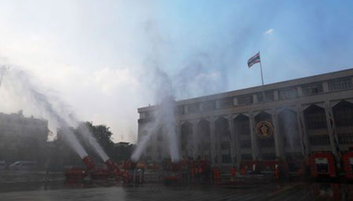 Thai capital fires water cannon into the air to fight pollution
