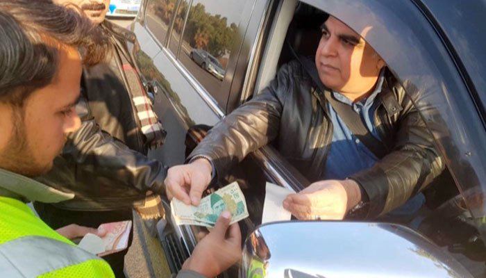 Sindh Governor Imran Ismail fined for traffic violation