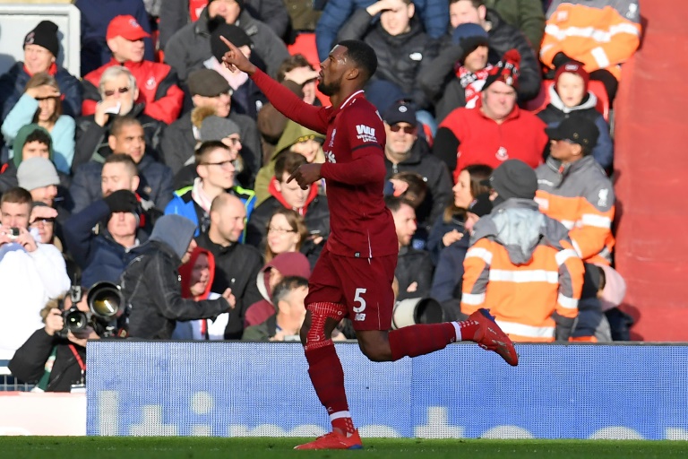 Pointing the way Georginio Wijnaldum celebrated after Liverpool's second goal in the Premier League leaders 3-0 win over Bournemouth at Anfield