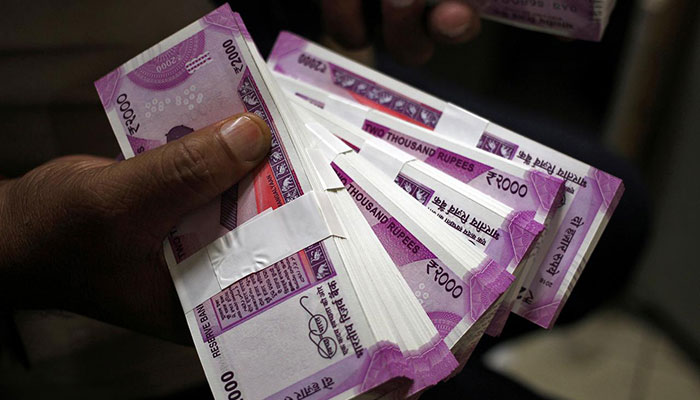 Dark days ahead for Indian rupee over trade, election jitters: Reuters poll