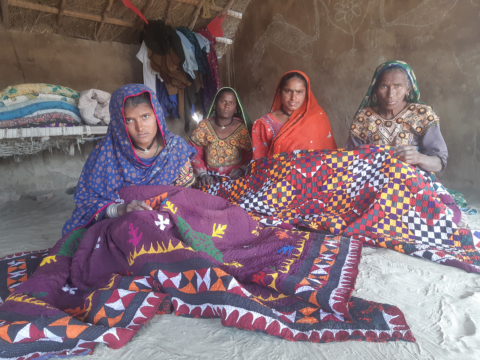 Women in Achro Thar’s do embroidery and stitching work