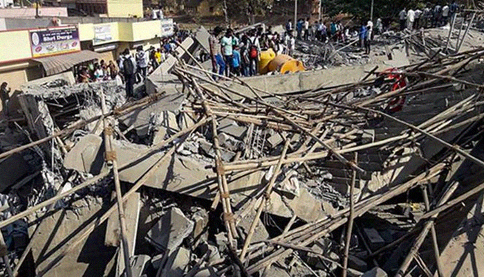 Two dead, dozens trapped, in India building collapse: officials