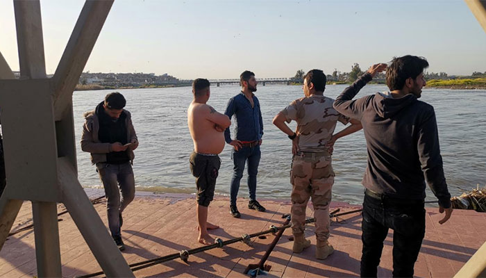 At least 72 killed as overloaded ferry sinks in Iraq's Tigris river