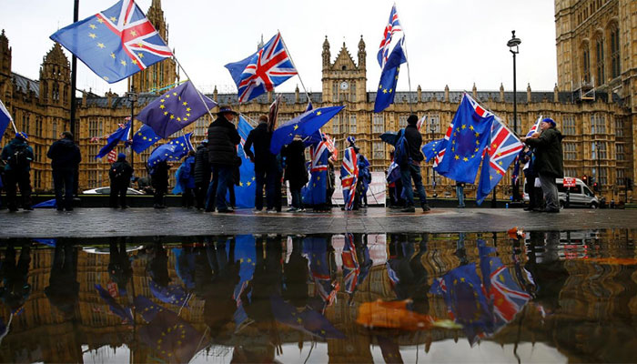 May in fight to retain grip on Brexit as parliament seeks control