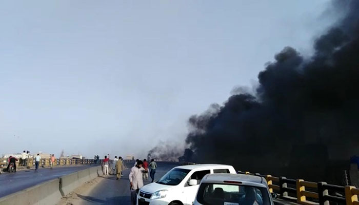 Oil tanker crashes, bursts into flames on Karachi's Gul Bai Flyover