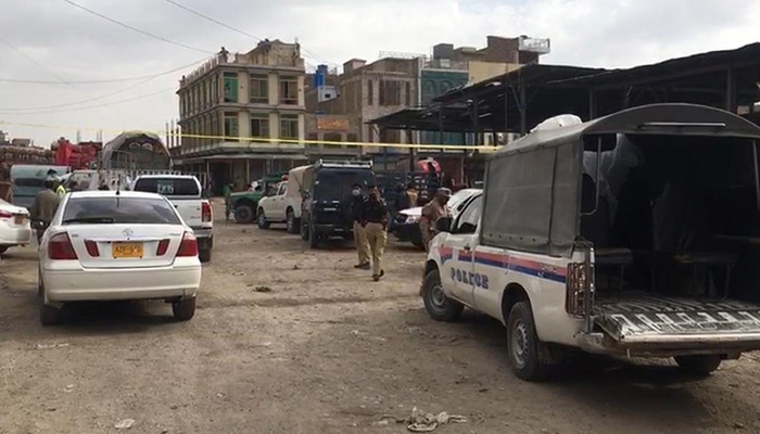 Security forces at the site of the blast