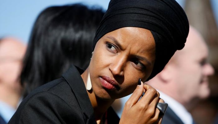 Ilhan Omar's supporters rally outside Trump event in Minnesota