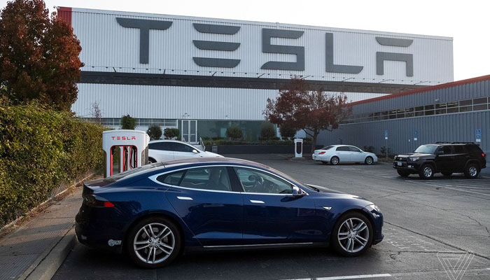 Tesla hit with big loss as car deliveries sputter
