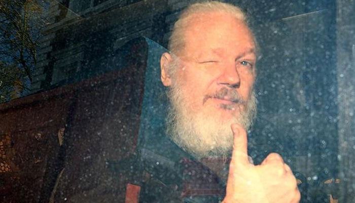 WikiLeaks founder Julian Assange arrives at the Westminster Magistrates Court after he was arrested in London Britain