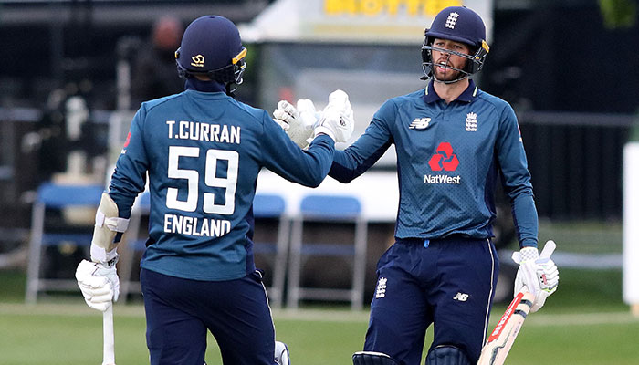 England overcome batting collapse to beat Ireland by four wickets