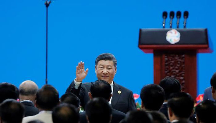 Amid trade war, China's Xi preaches openness, says no civilization superior
