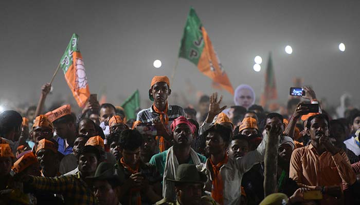 India shares hit record high over Modi election victory forecasts