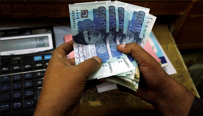 Pakistani rupee registers slight gains against US dollar