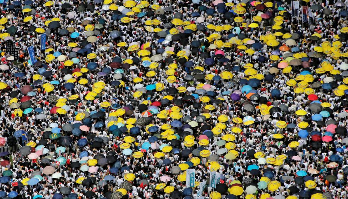 Hundreds of thousands march in Hong Kong to protest China extradition bill