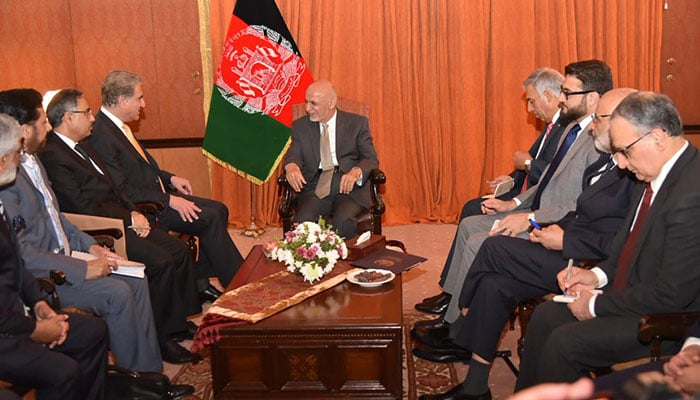 Afghan leader in Pakistan to talk ties, peace with Taliban
