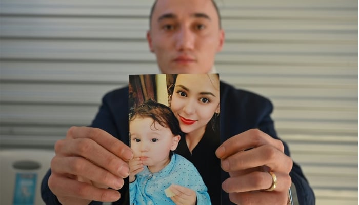 Australia calls on China to let Uighur mother and son leave
